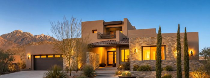 El Paso home with strong curb appeal lit at dusk